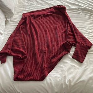 Woman’s off shoulder sweater